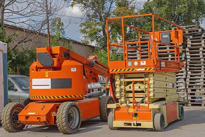 warehouse forklifts transporting goods in Hughson